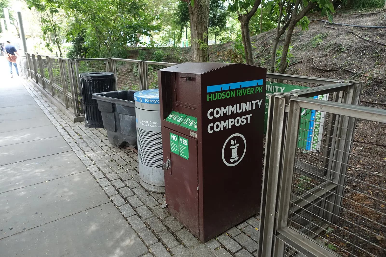 A clearly labeled community compost drop-off bin at Chelsea Waterside Park in Manhattan.